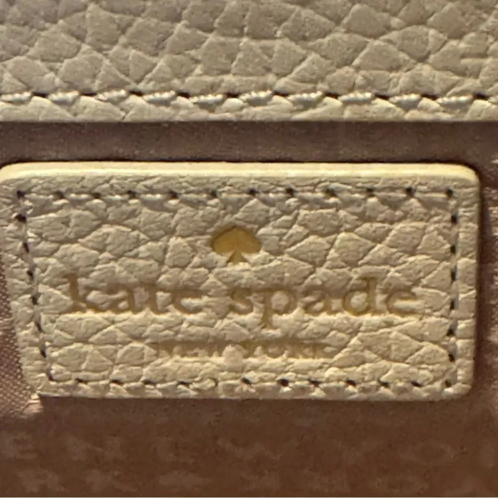 Kate Spade Chester Street Avie‎ Tassel Flap Close Zip-Around Crossbody Bag Cream